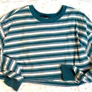 Blue/teal, white and lavender long sleeve shirt. Perfect as a statement piece!